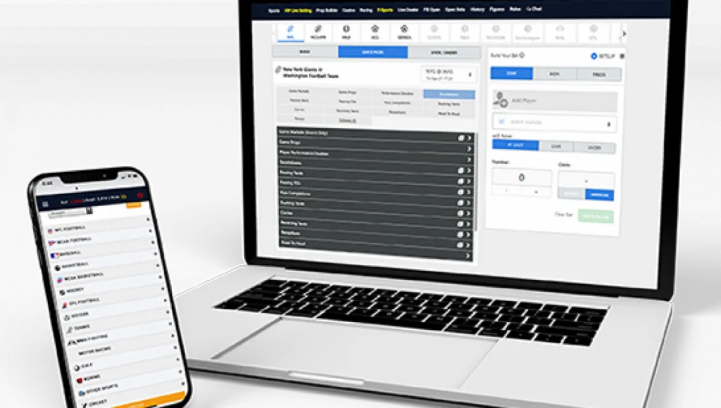 Laptop and phone displaying sportsbook software