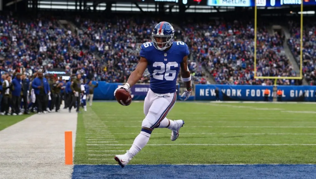 Football player carrying the ball