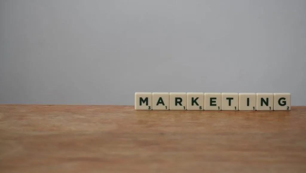 Wooden letters spelling marketing