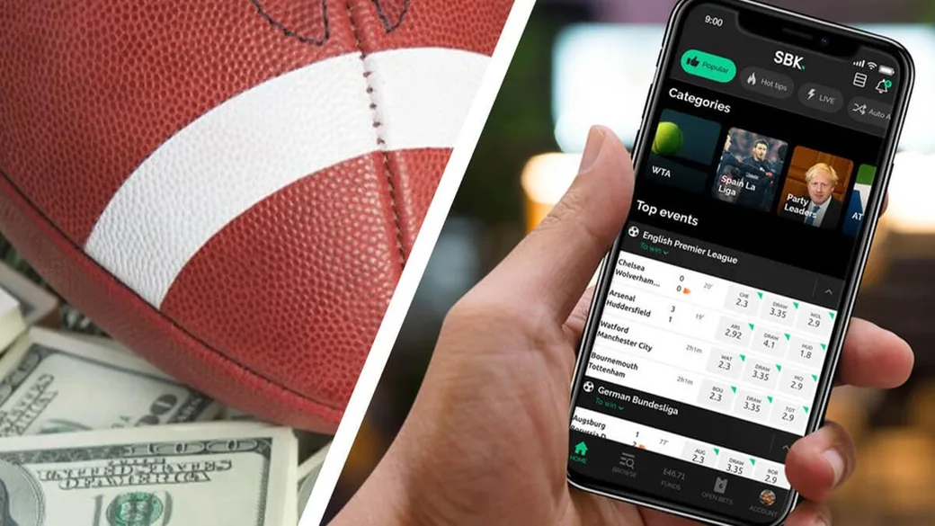 Football and a phone displaying sports information